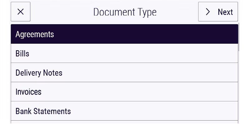 A close-up of a computer screen showing the Xerox Intelligent Filer interface with a document open and options to select a category for filing, highlighting automated categorization.